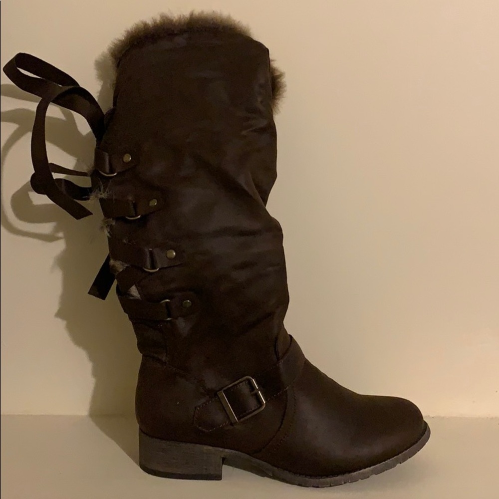 Brown boots with a tie in the back